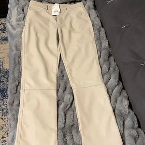 Woman faux leather cream pants